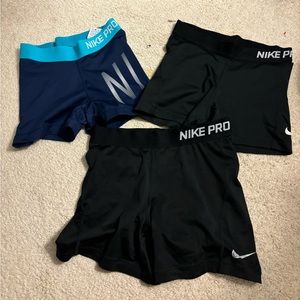 3 pairs of nike pros sizes vary